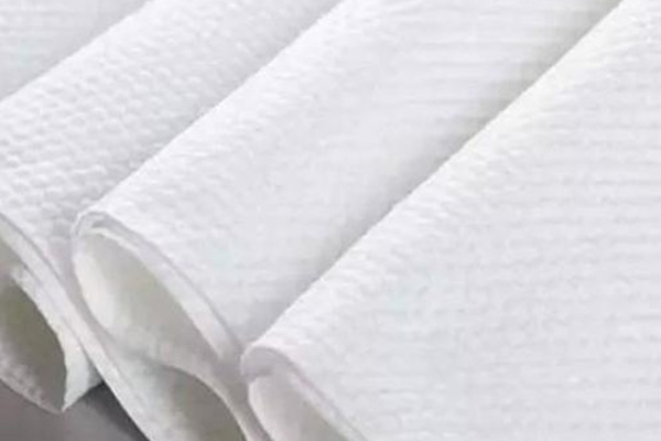 Semi-cross laying spunlace nonwoven fabric for wet wipes
